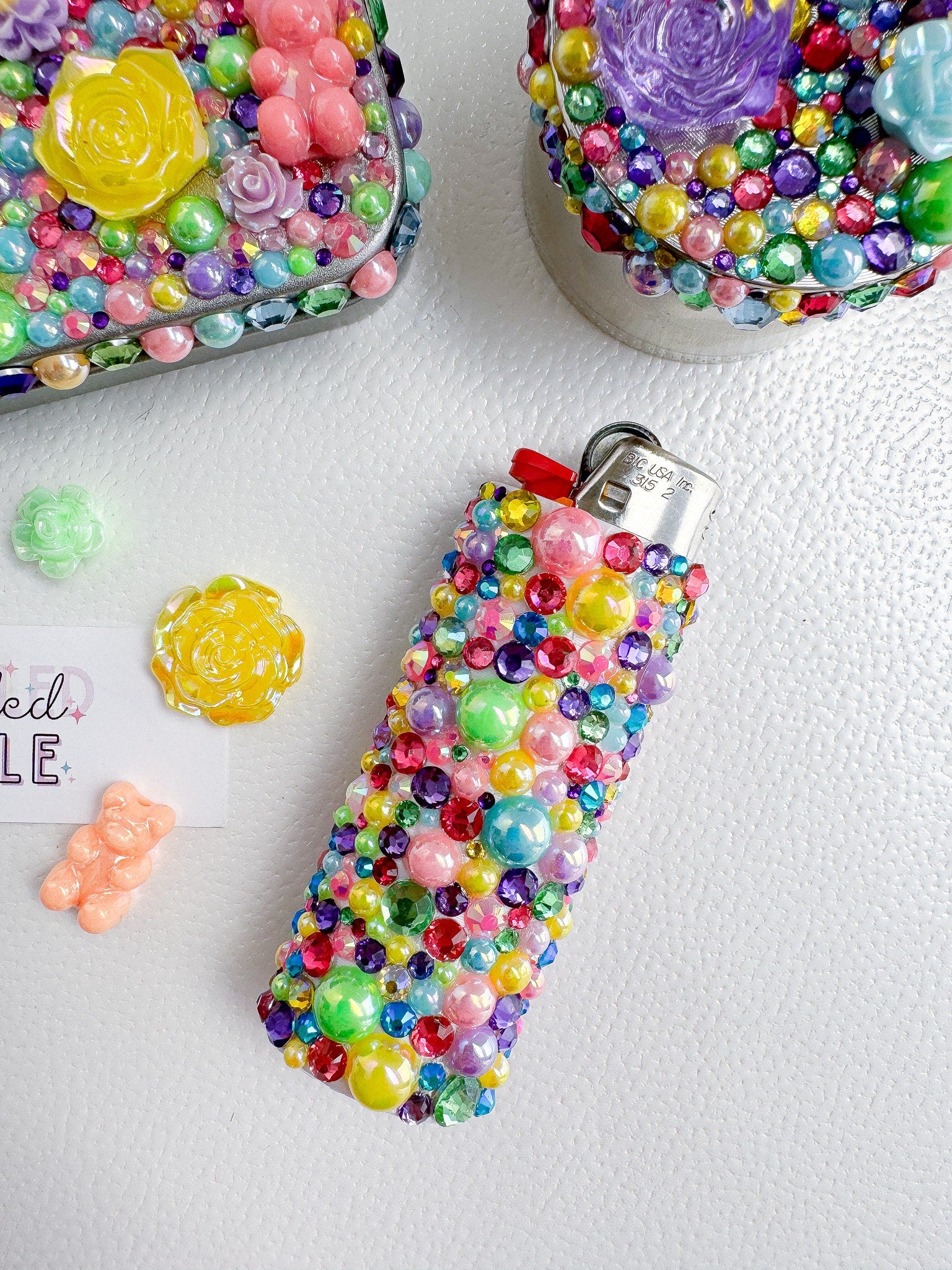 a cell phone case with a bunch of beads on it